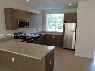EAST OF 5TH TOWNHOMES - Residential Lease