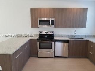 EAST OF 5TH TOWNHOMES - Residential Lease