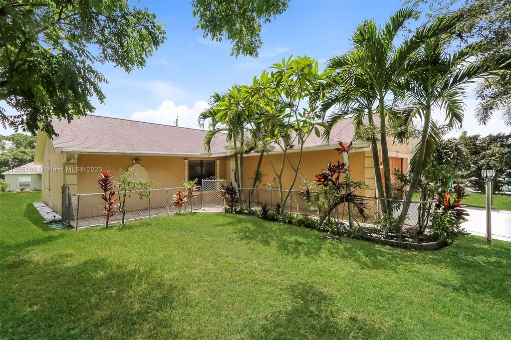 Photo of 1829 SW California Blvd, Port Saint Lucie, FL 34953 (MLS # A11355186)