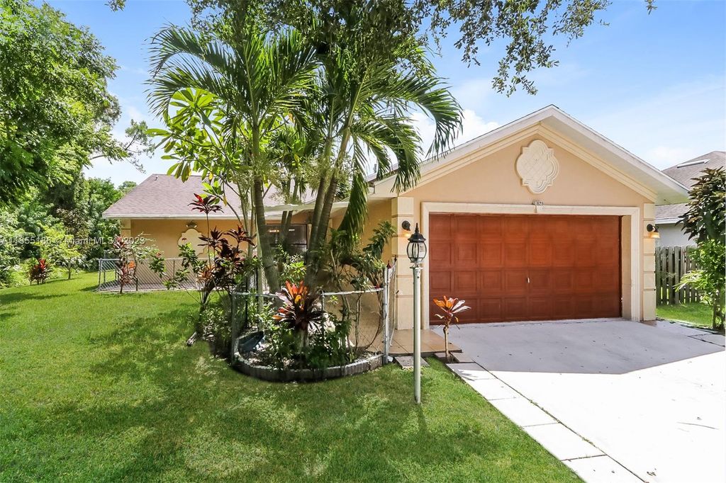 Photo of 1829 SW California Blvd, Port Saint Lucie, FL 34953 (MLS # A11355186)