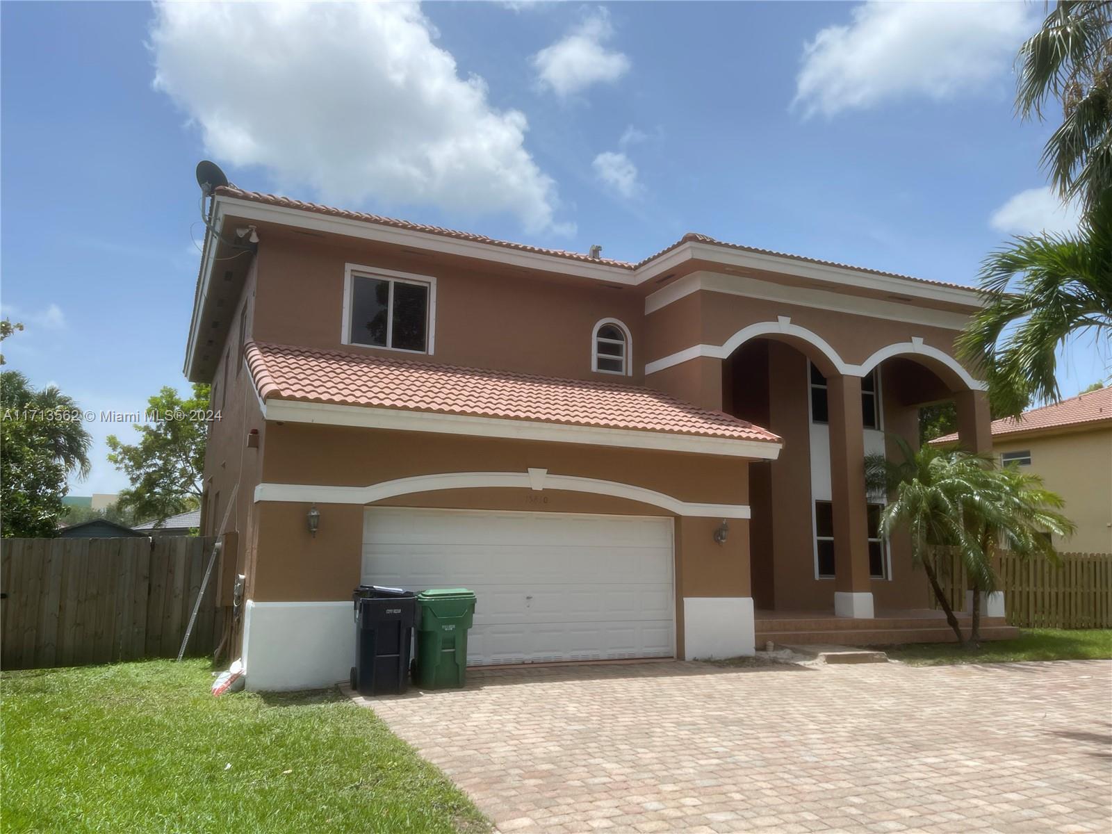 Beautiful constructed elegant and contemporary 4 bedroom /3 bathroom home. Grand 14ft ceiling. Dazzling porcelain floors, featuring modern touches, top of the line appliances, walk-in closets, no details were spared. This a family-friendly enclave in an ideal location near the FL Turnpike, restaurants, shopping outlets and A+ school.