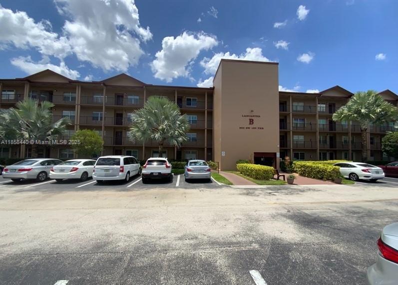 Gated community – Century Village! Spacious 2-bedroom, 2-bath unit with 1,352 sq. ft. of living space. Features tile and carpet flooring, enclosed balcony, ceiling fans, and a roomy kitchen filled with natural light. Washer and dryer conveniently located inside the unit. A storage unit. Enjoy resort-style amenities including a golf course, on-site restaurants, indoor pool, aerobics and dance studio, ballroom, and library. This is a Department of Housing and Urban Development property, Case #095-083702, being sold "AS IS". Property is classified as IN, meaning it meets FHA financing requirements with no obvious repairs needed.