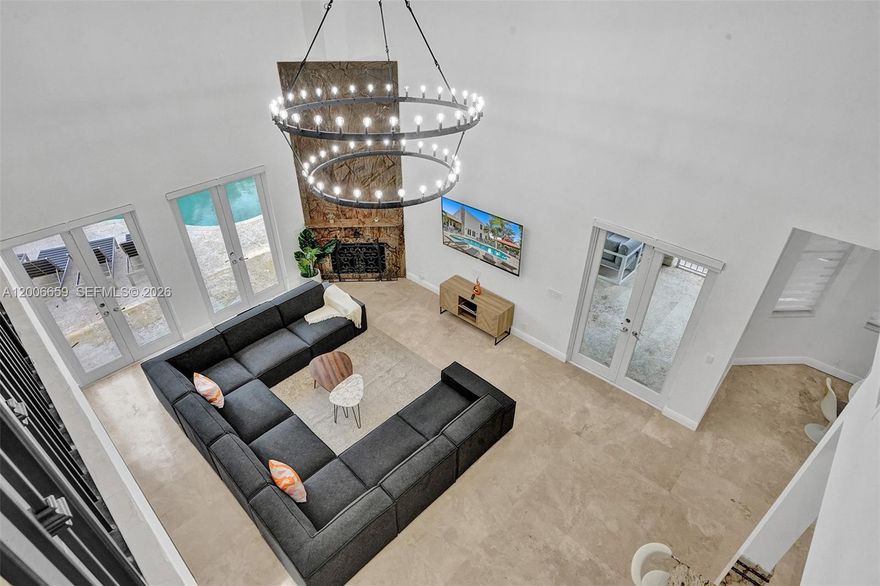 An exceptional opportunity to own a spacious 7-bedroom, 5-bath home offering over 8,000 sq ft of refined living space in Plantation. Designed with both comfort and entertaining in mind, this residence features a private pool, dedicated home theater, and a large game room perfect for hosting family and guests. The open, airy layout is filled with natural light and centered around a chef’s kitchen that blends style and function. Situated in a quiet neighborhood while remaining just minutes from Fort Lauderdale’s renowned beaches, shopping, dining, and conveniences. A well-balanced home that delivers space, privacy, and an elevated lifestyle.