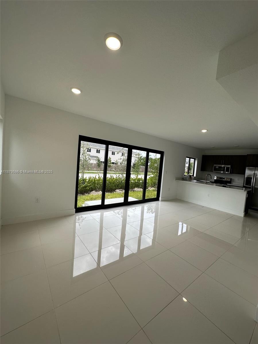 Beautiful single family home, 5 bed and 4.5 bath, with patio and garage, 2 story, located in the Aurora Community. Impact door and windows, stain still appliances, quartz countertop. This house is first floor entry with in-law suite with a full bath. Low Hoa, modern and contemporary design. Seller Motivated....