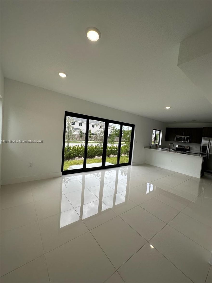 Beautiful single family home, 5 bed and 4.5 bath, with patio and garage, 2 story, located in the Aurora Community. Impact door and windows, stain still appliances, quartz countertop. This house is first floor entry with in-law suite with a full bath. Low Hoa, modern and contemporary design. Seller Motivated....