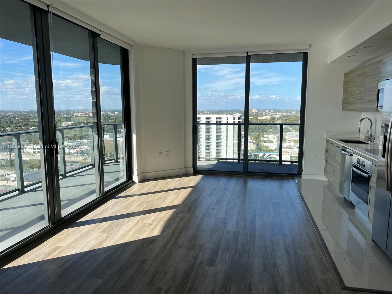 Hyde Midtown, 2BD/2BA corner unit, brand new laminate woodgrain floors throughout. Split bedroom plan. Large wrap around balcony. Unit features top of the line stainless steel appliances, newer washer & dryer, window treatments and more. Amazing pool deck with Biscayne Bay and Skyline views and all the amenities such as tennis court, full service spa, state-of-the-Art Fitness Center with a spinning studio, movie theater and more. One valet parking space included. Located in the heart of Midtown steps away from all the restaurants and shopping. Easy access to highways will take you to the Airport or Miami Beach in minutes. Walking distance to Wynwood and Design District!