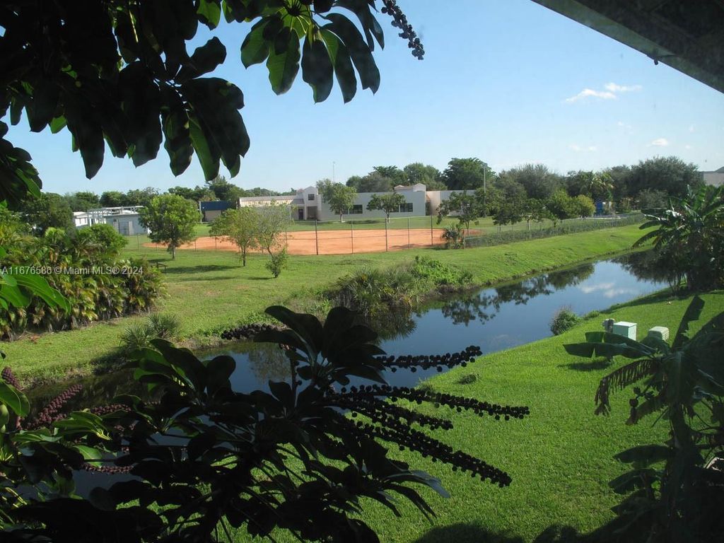 Photo of 10007 Twin Lakes Dr #25-O, Coral Springs, FL 33071 (MLS # A11676586)