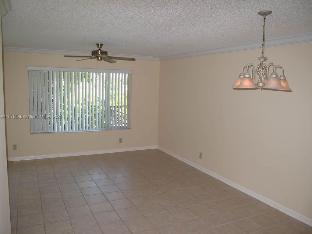 Photo of 10007 Twin Lakes Dr #25-O, Coral Springs, FL 33071 (MLS # A11676586)