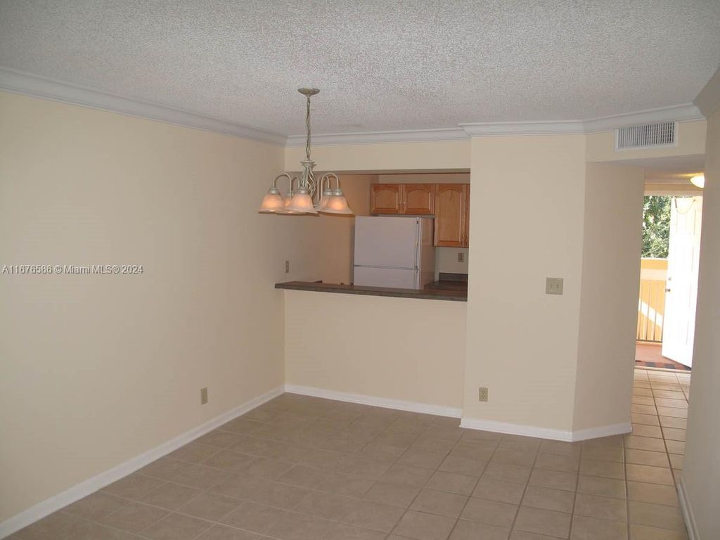 Photo of 10007 Twin Lakes Dr #25-O, Coral Springs, FL 33071 (MLS # A11676586)