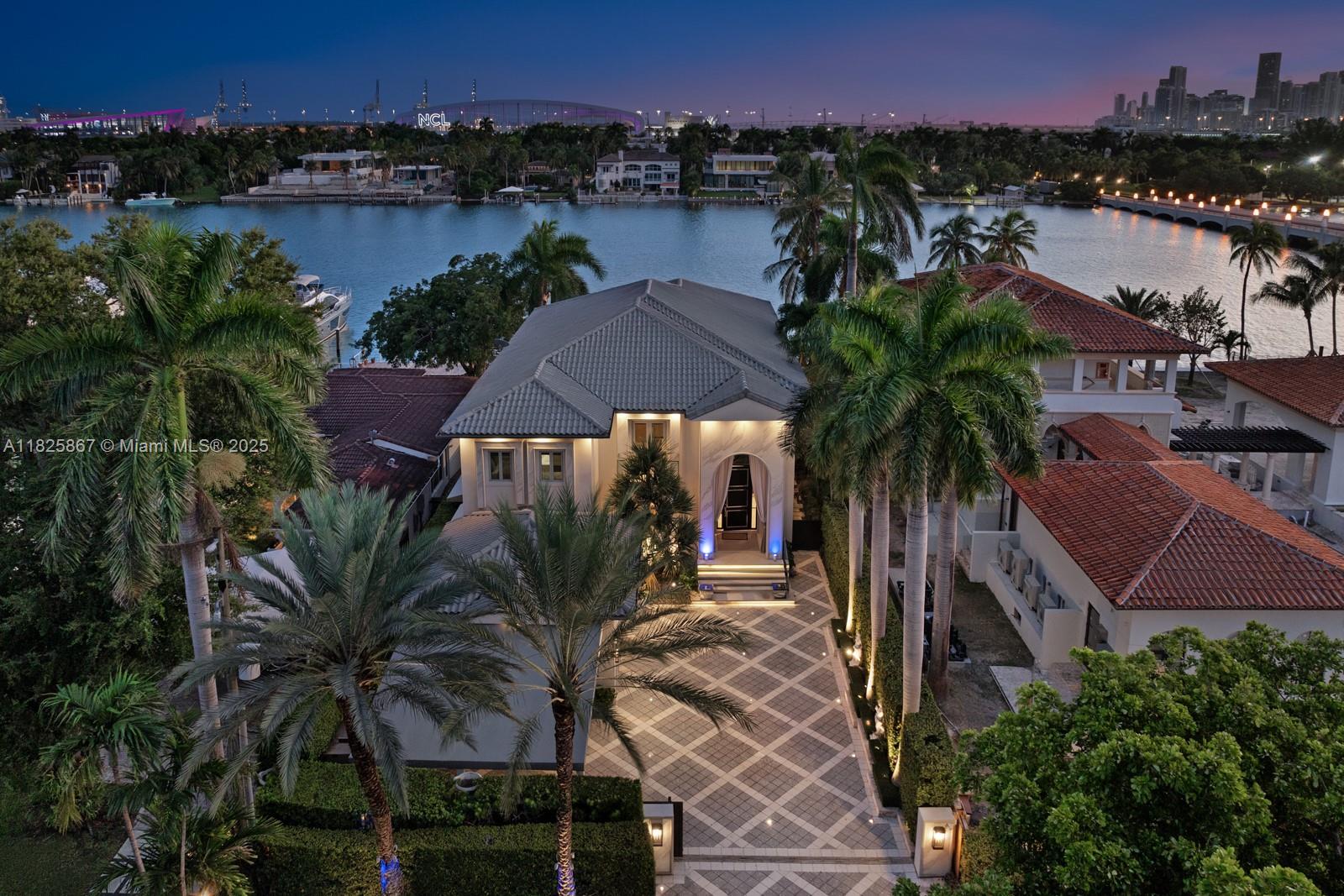 Welcome to luxury waterfront living at 176 S Hibiscus Drive in the heart of Miami Beach! This stunning 6-bed, 6.5-
bath residence offers 60 feet of prime waterfront on one of the most prestigious islands in Miami Beach, with
breathtaking views of downtown Miami. Equipped with two boat lifts—one holding 40,000 pounds & the other
20,000 pounds—a private dock,& summer kitchen, this home is a boater’s dream. A generator that powers the
entire home. Inside, the high-end finishes & smart home technologies are evident. Mia Cucina kitchen is a chef’s
delight, complemented by an elegant bar, & wine cellar. Unparalleled convenience, comfort,& security. Located on
the prestigious Hibiscus Island, enjoy the best of Miami Beach living—close to world-class shopping, dining, &
entertainment.