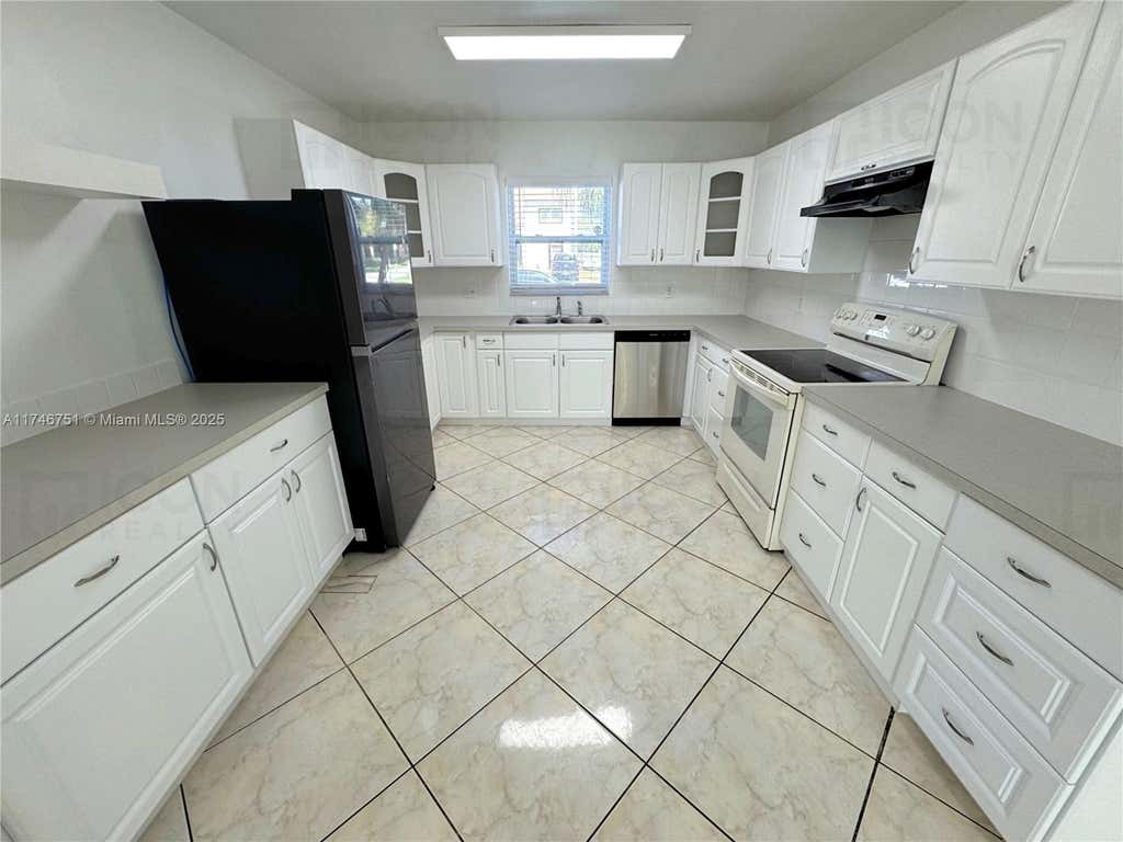 Photo of 9050 NW 35th Pl, Sunrise, FL 33351 (MLS # A11746751)