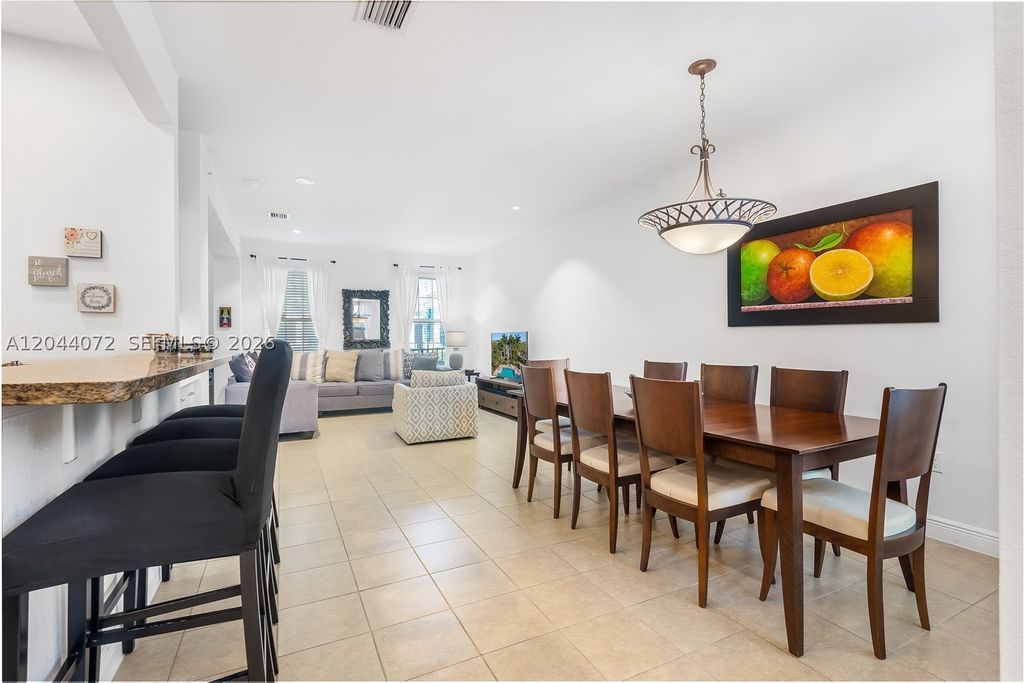 Photo of 1119 SW 147th Ave, Pembroke Pines, FL 33027 (MLS # A12044072)