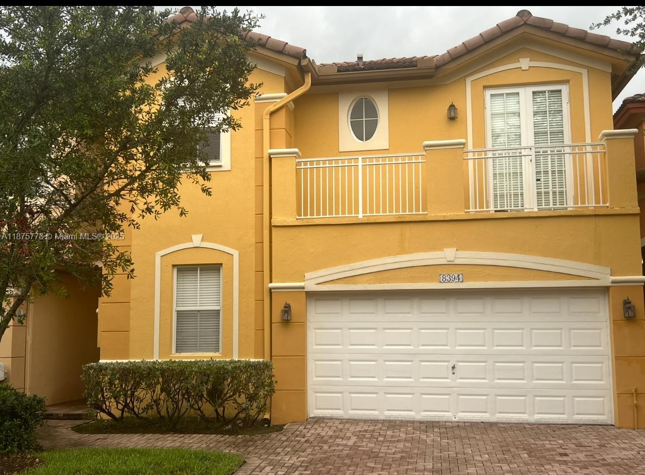 Stunning townhouse in the sought-after Madeira at Islands at Doral. Featuring 5 bedrooms, 3 bathrooms (one bedroom/bath on the first floor), this home boasts quartz countertops, stainless steel appliances, tile throughout. The 2-car garage converted. Enjoy a spacious updated patio and resort-style amenities: clubhouse with pools, tennis, gym, basketball, playgrounds, and more. Perfectly located near shops, dining, top schools, and major highways—luxury, versatility, and convenience in one.