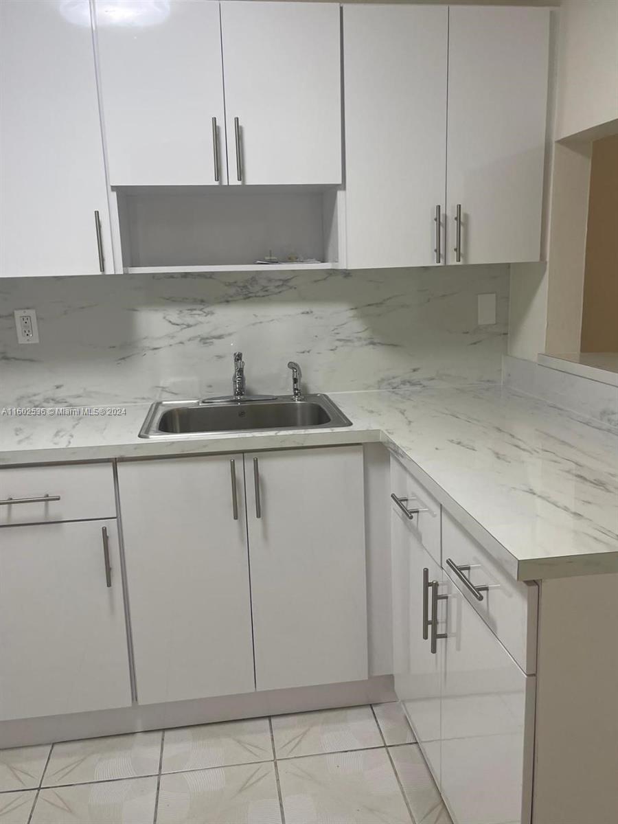 INTERIOR PICTURES COMING SOON!!! Completely remodeled 2/2 condo. Ready to occupy July 1st.
