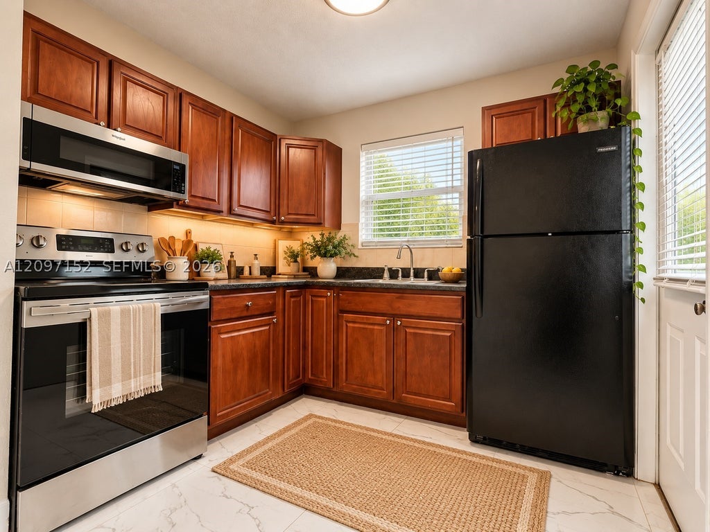 Photo of 616 SW 14th Ave #102, Fort Lauderdale, FL 33312 (MLS # A12097152)