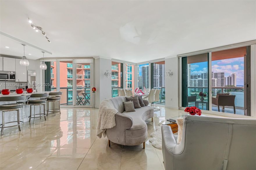 Stunning renovated 2BR/2.5BA residence offering direct Intracoastal and Ocean views from every room. A semi-private elevator landing welcomes you into this beautifully updated home featuring floor-to-ceiling windows and a custom open-concept kitchen created by removing a full wall, resulting in a rare expansive layout with an oversized island and breakfast bar—ideal for entertaining. The split-bedroom floor plan offers spacious ensuite baths and excellent closet space. Enjoy seamless indoor-outdoor living with three private east facing terraces, perfect for daily sunrises. Additional highlights include a separate laundry.
Hidden Bay is a full-service, resort-style community featuring tennis, pickleball and basketball courts, private marina, dog park, fitness center and spa with daily classes, party room, and a waterfront pool. Unbeatable Aventura location with walkability to Aventura Mall, top dining, houses of worship, and within the highly sought-after Aventura Charter School district.