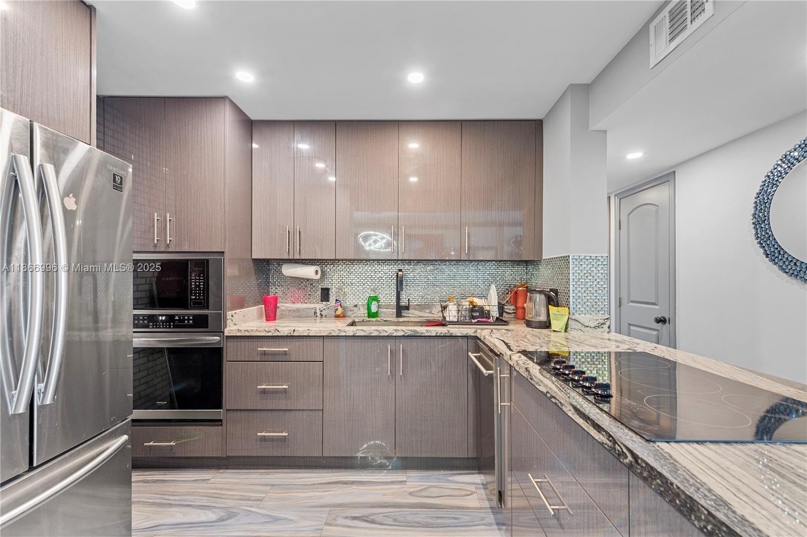 Experience elevated living in this exquisitely renovated 2-bedroom, 2-bath residence in the heart of Miami Beach. Designed with style and comfort in mind, the home showcases polished marble floors, a sleek custom chef’s kitchen, and refined finishes throughout. Floor-to-ceiling windows frame panoramic views of the canal and ocean, bringing natural light and beauty into every room. Residents enjoy exclusive access to a sparkling pool, secure gated entry with key code, and enhanced private security features. Step outside and immerse yourself in the vibrant energy of Lincoln Road’s restaurants, boutiques, and nightlife—all just moments from your door. Available now, with at least 24-hours notice required for showings.