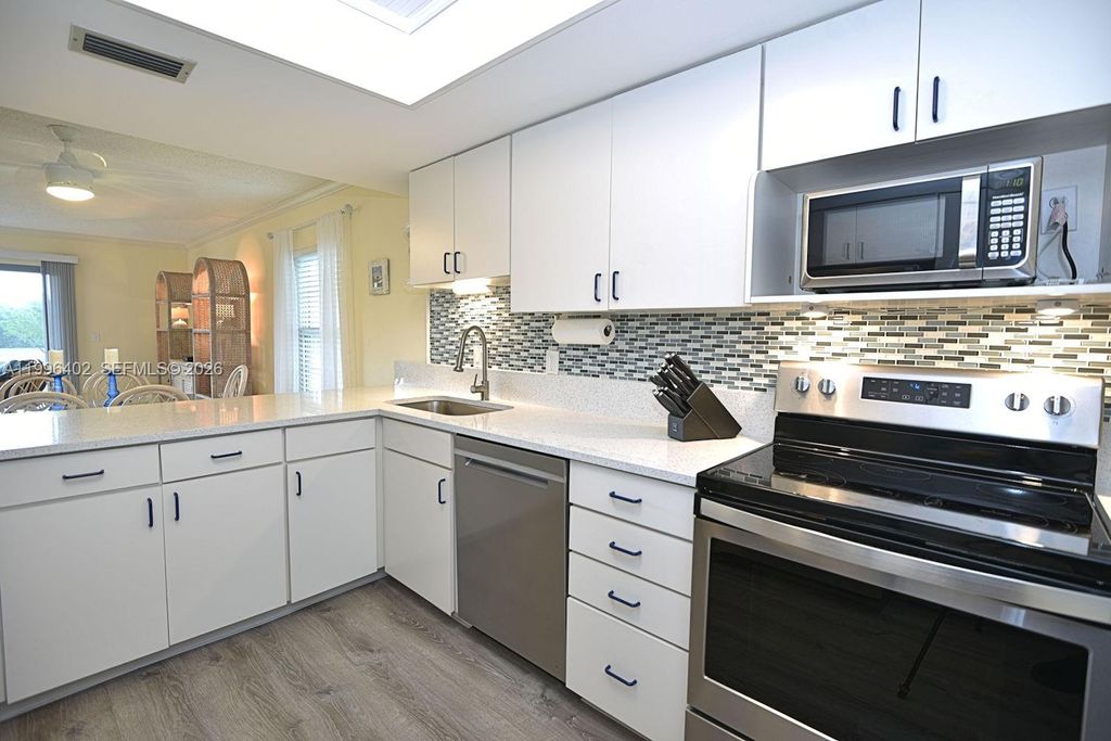 Photo of 18459 SE Wood Haven Ln #J, Jupiter, FL 33469 (MLS # A11996402)