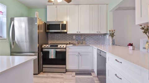 Photo of 8605 W Sample Rd #202, Coral Springs, FL 33065 (MLS # A11972314)