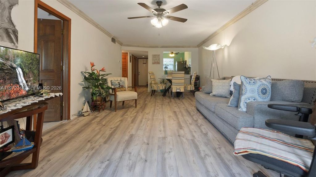 Photo of 8605 W Sample Rd #202, Coral Springs, FL 33065 (MLS # A11972314)