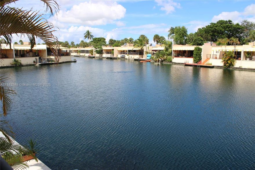 Beautiful lakefront 3 bedroom 2 bath townhouse in Prime location, right in the heart of Miami Lakes, with excellent schools, shopping, theatre, athletic club and houses of worship, and more, in very close proximity.  Live the Miami Lakes lifestyle where all necessities are within walking distance.  This very spacious townhouse with remodeled bathrooms is ready for new owners.  Main Street, with it's shops and great restaurants, and the farmers market are just a short 5 minute walk away.  Relax on your large covered lakefront terrace. VERY low HOA maintenance of only $600 YEARLY for a very safe and well maintained community. Don't miss this opportunity!!