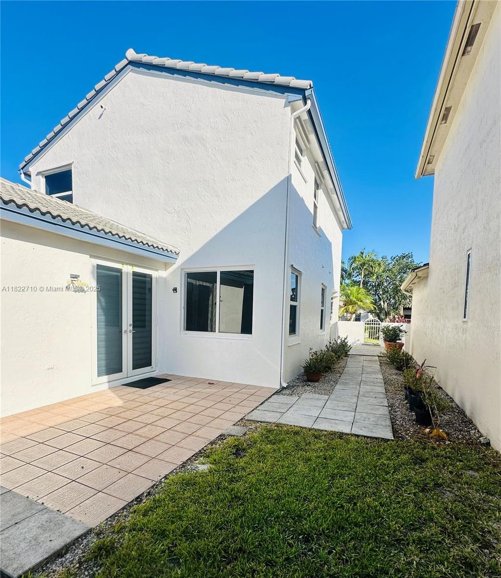 Photo of 18961 NW 22nd St, Pembroke Pines, FL 33029 (MLS # A11822710)