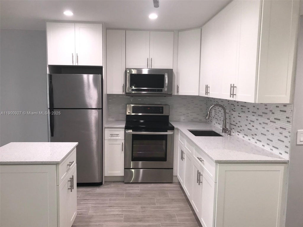 Photo of Deerfield Beach, FL 33442 (MLS # A11900927)