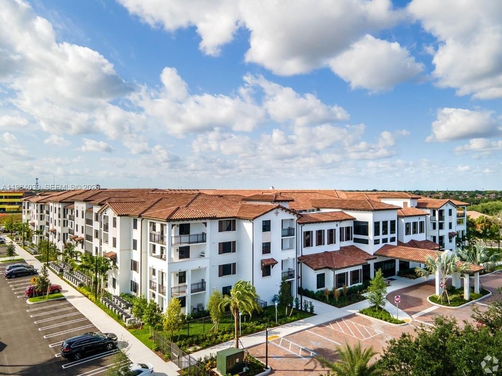 Photo of 3991 NW 82nd Ave #1-213, Cooper City, FL 33024 (MLS # A11984039)