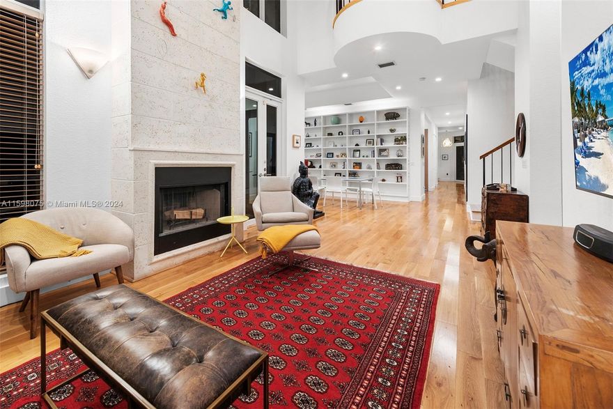 Nestled among the tropical Banyan trees & lush surroundings, this exquisite home blends modern luxury w/warm & inviting charm. The large windows & high ceilings illuminate the space w/natural light, highlighting the elegant Oak hardwood floors. The newly custom built gourmet kitchen equipped w/top-of-the-line appliances, quartz countertops & custom cabinetry are perfect for everyday living & entertaining. The primary suite provides a private retreat complete w/an updated en-suite bathroom & direct access to the beautifully landscaped backyard w/a pool & newly installed deck. This highly sought-after area is close to top-rated schools, shopping, dining & vibrant cultural attractions, making it an ideal for those seeking a refined & comfortable lifestyle in the heart of Coconut Grove.