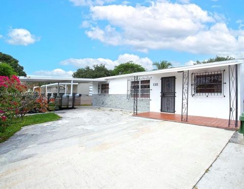 Photo of 1311 SW 33rd Ter, Fort Lauderdale, FL 33312 (MLS # A11948797)