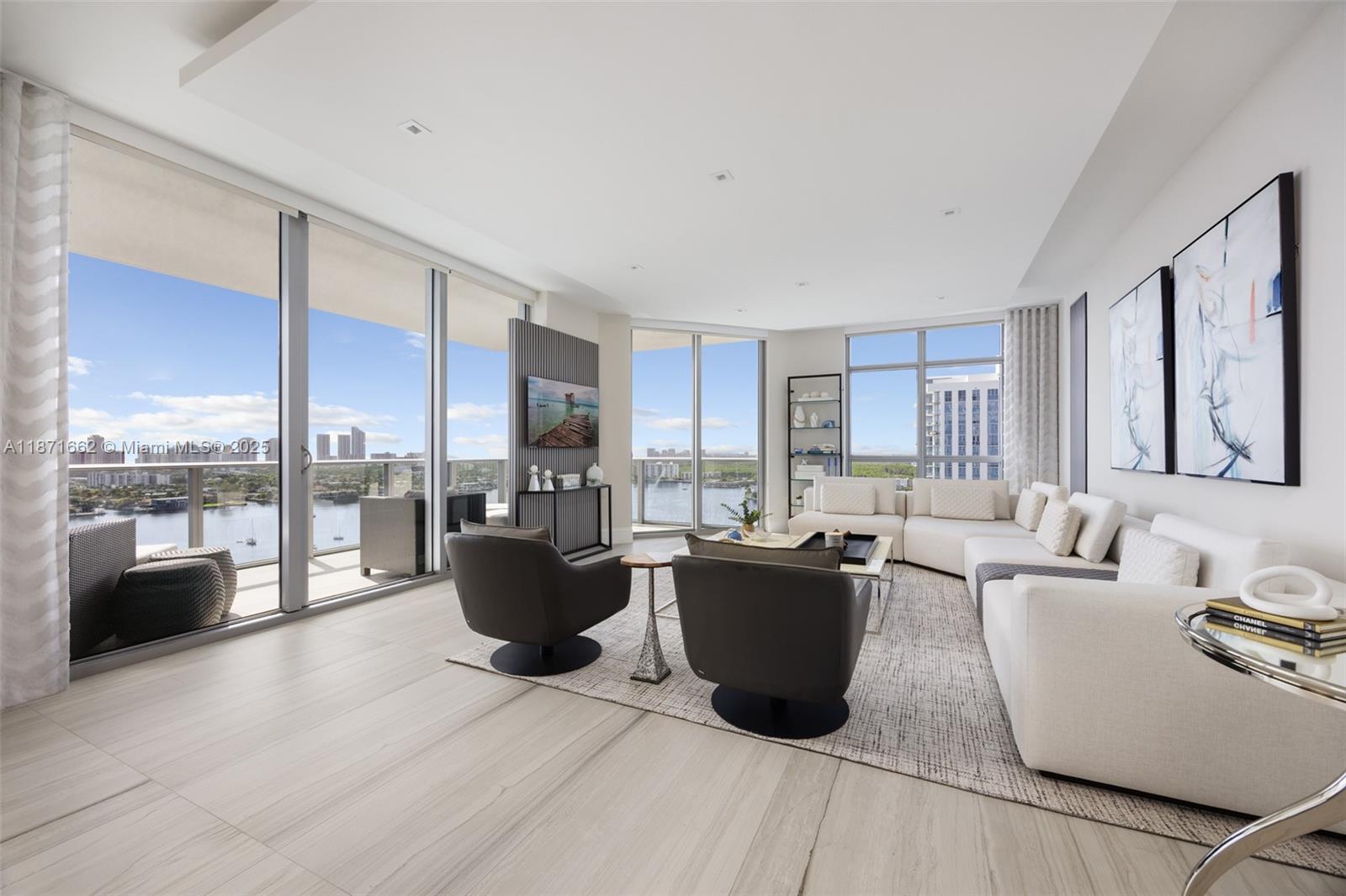 Residence 2009 at Marina Palms is a high-floor southeast corner home with 3 bedrooms, 3.5 bathrooms, and 2,219 SF of refined living. Enjoy sweeping views of the Intracoastal, Atlantic Ocean, and Miami skyline from every room. This rare offering includes a private deeded boat slip for vessels up to 60 feet, bringing your yacht right to your doorstep. Interior features include porcelain flooring, marble-appointed baths, and a gourmet kitchen with Snaidero cabinetry and Wolf, Sub-Zero, and Miele appliances. An expansive terrace extends the living space outdoors. Residents enjoy world-class amenities: spa, fitness center, infinity-edge pool, private marina with dock master, butler service, plus two garage spaces and a storage unit.