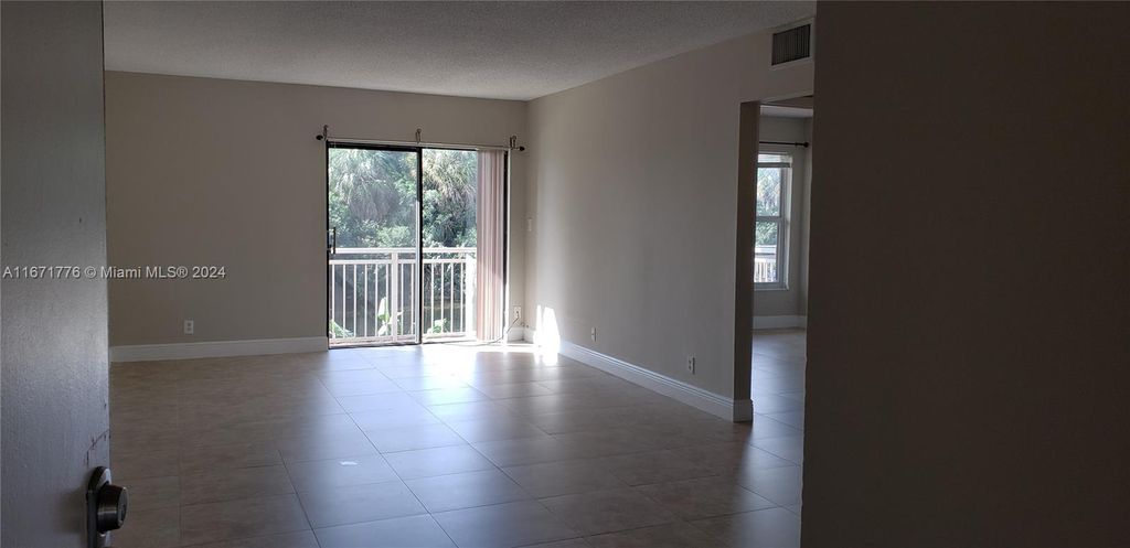 Photo of 405 S Pine Island Rd #207D, Plantation, FL 33324 (MLS # A11671776)