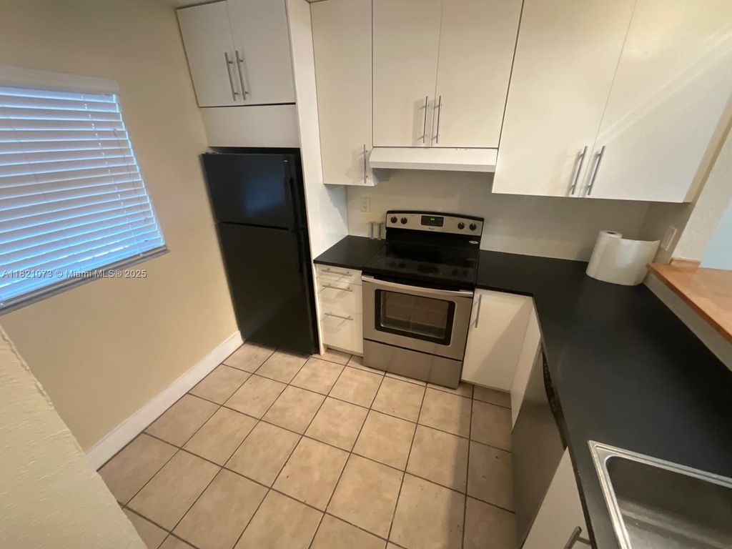 Photo of 3470 Foxcroft Rd #211, Miramar, FL 33025 (MLS # A11821073)