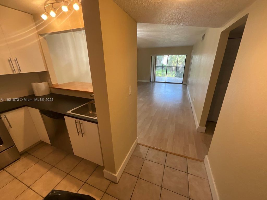 Photo of 3470 Foxcroft Rd #211, Miramar, FL 33025 (MLS # A11821073)