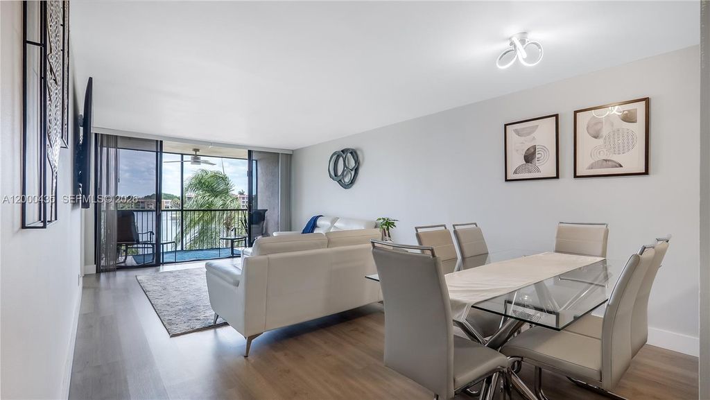 Photo of 6231 Coral Lake Dr #307, Margate, FL 33063 (MLS # A12000435)