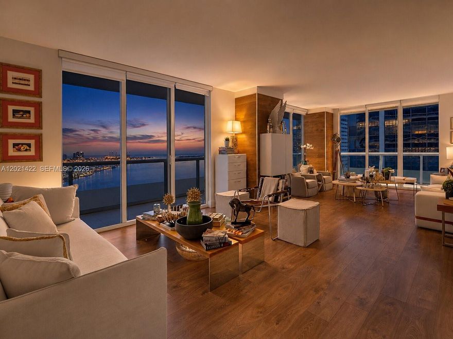 The best line at 50 Biscayne & at the best price! This stunning 3BR/2BA corner unit is the crown jewel of the building. Breathtaking views, prime location, unmatched lifestyle. With wood flooring and floor-to-ceiling windows, this home showcases breathtaking views of Biscayne Bay. The master suite offers dual vanities, a glass-enclosed shower, a soaking tub, and two walk-in closets, with direct access to a private balcony. The open-concept living area flows seamlessly onto a 400 wrap-around balcony, perfect for elegant entertaining or serene relaxation. Residents enjoy exclusive amenities, including a fitness center, spa, resort-style pool, and 24-hour concierge. Located steps from Miami’s finest dining, shopping, and cultural attractions, this home offers the ultimate urban lifestyle.