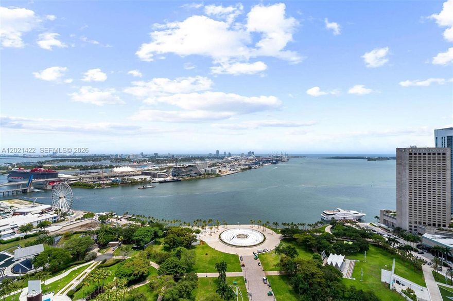The best line at 50 Biscayne & at the best price! This stunning 3BR/2BA corner unit is the crown jewel of the building. Breathtaking views, prime location, unmatched lifestyle. With wood flooring and floor-to-ceiling windows, this home showcases breathtaking views of Biscayne Bay. The master suite offers dual vanities, a glass-enclosed shower, a soaking tub, and two walk-in closets, with direct access to a private balcony. The open-concept living area flows seamlessly onto a 400 wrap-around balcony, perfect for elegant entertaining or serene relaxation. Residents enjoy exclusive amenities, including a fitness center, spa, resort-style pool, and 24-hour concierge. Located steps from Miami’s finest dining, shopping, and cultural attractions, this home offers the ultimate urban lifestyle.