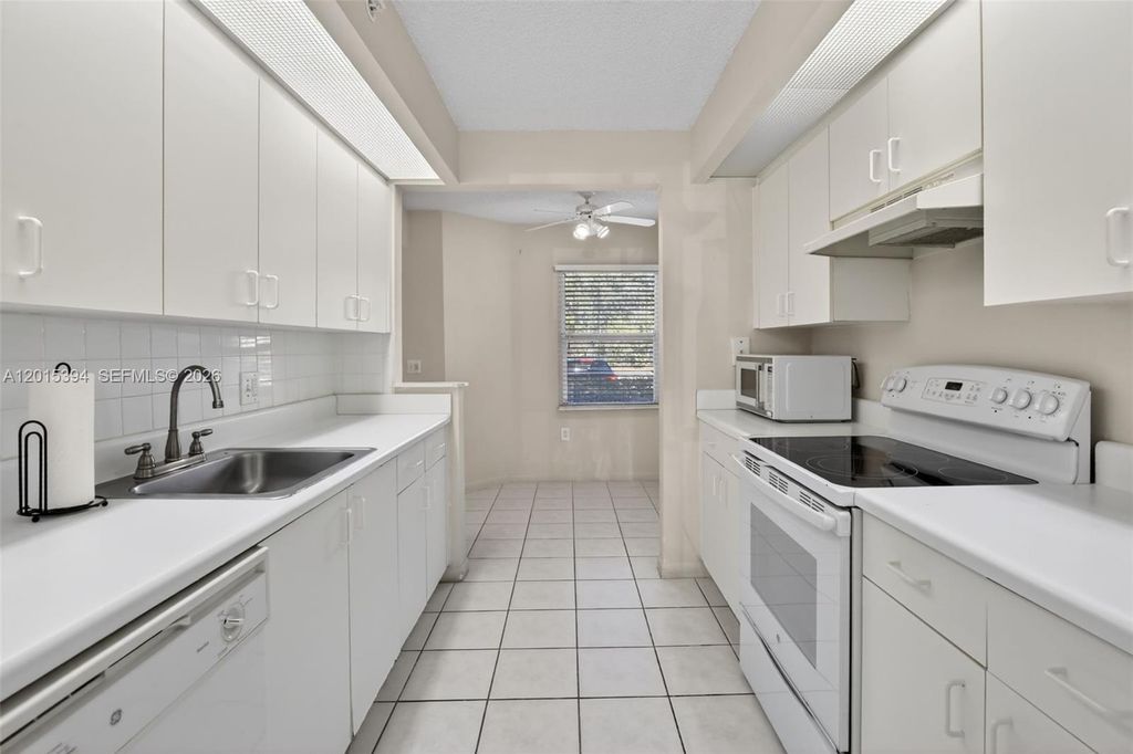 Photo of 700 SW 137th Ave #110H, Pembroke Pines, FL 33027 (MLS # A12015394)