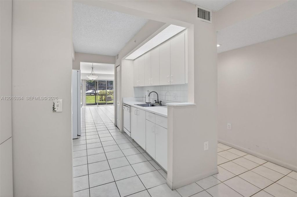 Photo of 700 SW 137th Ave #110H, Pembroke Pines, FL 33027 (MLS # A12015394)