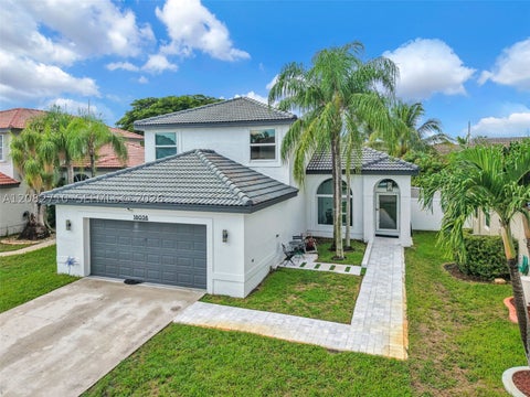 Photo of 18038 SW 12th Ct, Pembroke Pines, FL 33029 (MLS # A12082710)