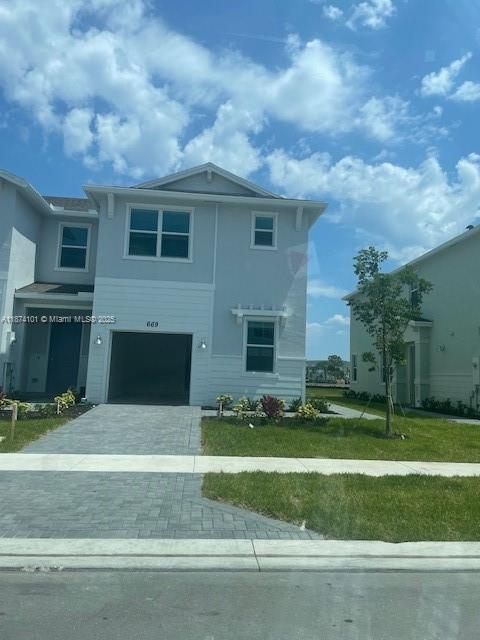 Newer Townhome from 2024 In gated community Veranda Landing, lake view .Tile in first floor, carpet upstars. 3 bedrooms 2.5 baths plus an extra room/ Den or office in first floor . Italian white cabinets, quartz countertops, stainless steel appliances. Hurricane impact windows through out the whole house. Easy to show. Quick move in.
House is fenced