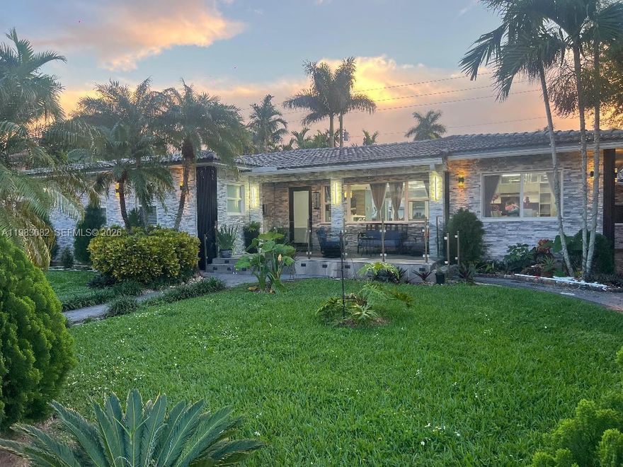 Renovated and furnished single-family home in Hollywood Lakes. featuring a spacious porch to enjoy sunsets and panoramic views of the golf course from the kitchen, dining room, living room, and master bedroom. The other bedrooms, along with the living and family rooms, offer views of the pool area, which includes three fountains and a fire pit. The backyard invites outdoor living, with a covered space well-lit for family gatherings, right by the pool. The area includes an incorporated BBQ in stainless steel and a large granite countertop, perfect for alfresco dining.

The home is equipped with impact doors and windows, providing both security and energy efficiency. Spacious kitchen cabinets, abundant natural lighting throughout the house, tankless water heater and gas services for the stove and BBQ, complete the offering. Additionally, the spacious driveway offers ample parking space. 

This property combines style, comfort, and functionality, ideal for those seeking to live annual or seasonal in an unbeatable and truly strategic location just minutes from the beach, Fort Lauderdale International Airport, the cruise port, downtown Hollywood, casinos like Hard Rock, a variety of restaurants, premier shopping destinations such as Aventura Mall, and just a few minutes away—horse racing at Gulfstream Park, close to everything you may need. Perfect for those seeking a comfortable, elegant home that is well connected in one of the most desirable areas of the city. Pets welcome!