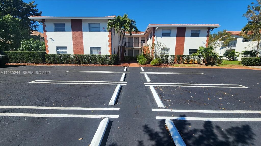Photo of 3090 Coral Springs Dr #6, Coral Springs, FL 33065 (MLS # A11935244)