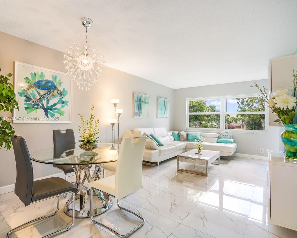 Photo of 5121 W Oakland Park Blvd #205, Lauderdale Lakes, FL 33313 (MLS # A11779647)