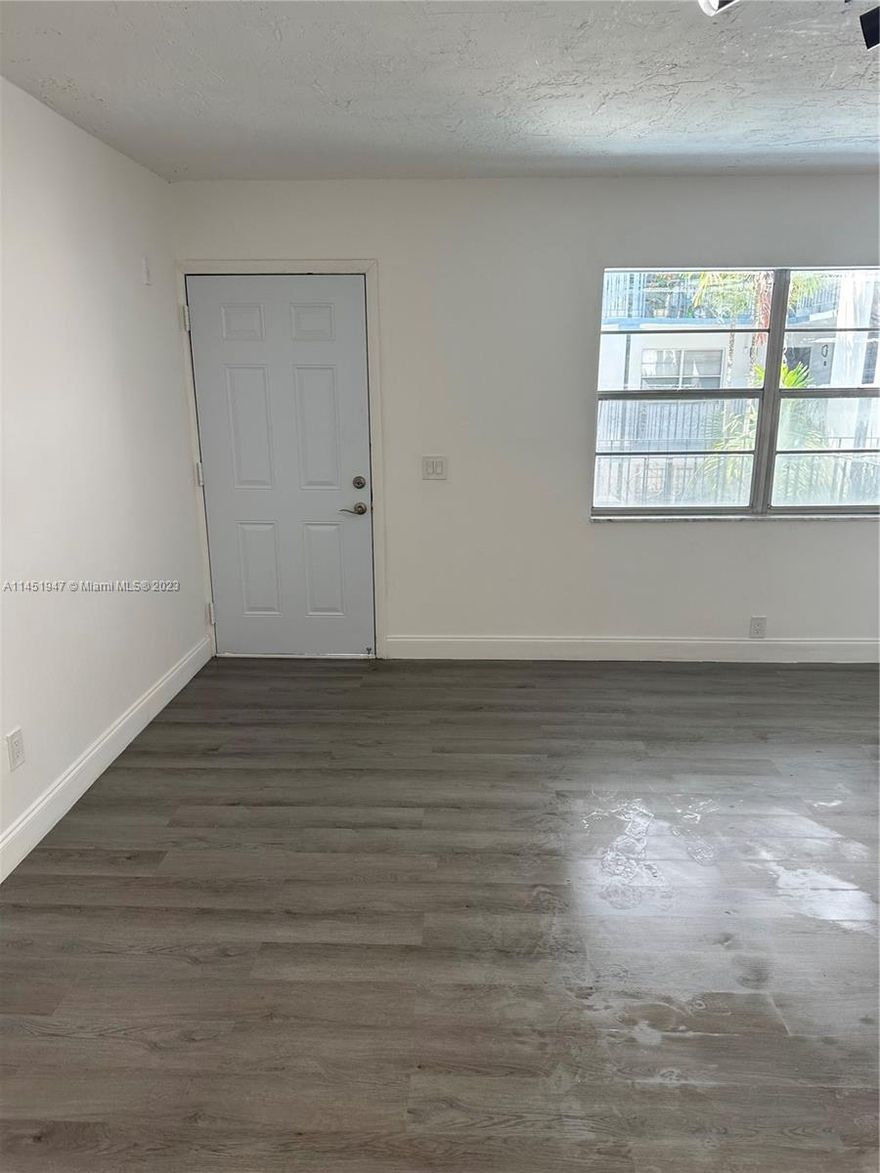This condo is in the heart of North Miami and is located minutes away from the highways, beaches, prestigious Bal Harbour, and Aventura. The owner spared no expenses with a new AC unit, and stainless steel appliances, lighting. The bathroom and kitchen have been completely remodeled, with new porcelain and vinyl flooring, new cabinetry with soft close doors and draws, and doors inside and out. The building also recently underwent major renovations which include a new roof and painting. The association fee includes water and common area amenities. This unit is a must-see.a lot of light.