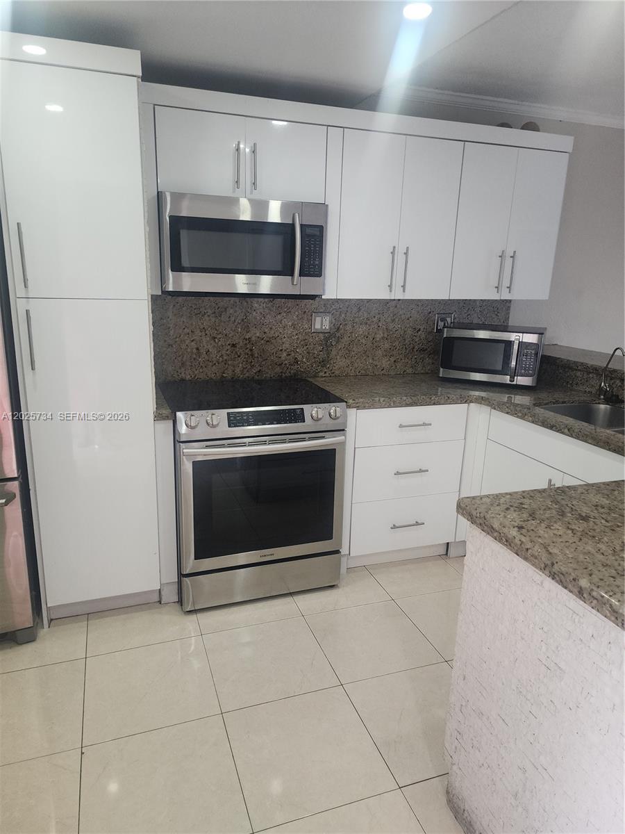 VISTA DEL LAGO CONDO VII - Residential Lease