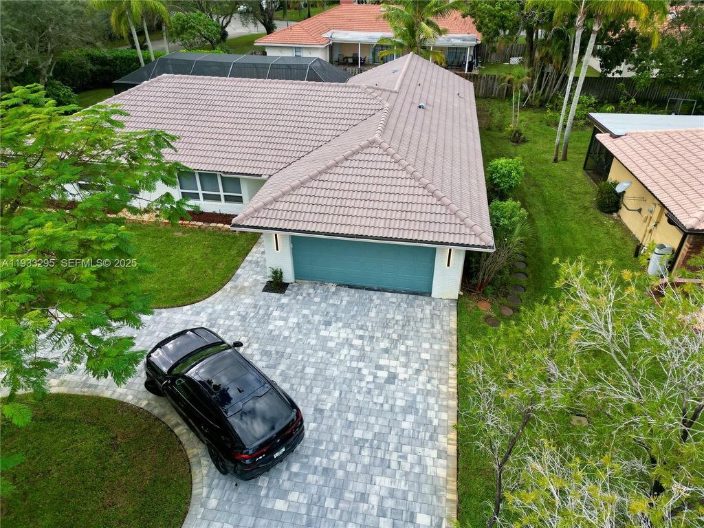 Photo of 1218 NW 111th Ave, Coral Springs, FL 33071 (MLS # A11933295)
