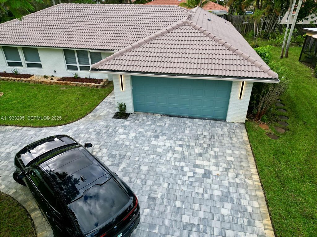 Photo of 1218 NW 111th Ave, Coral Springs, FL 33071 (MLS # A11933295)
