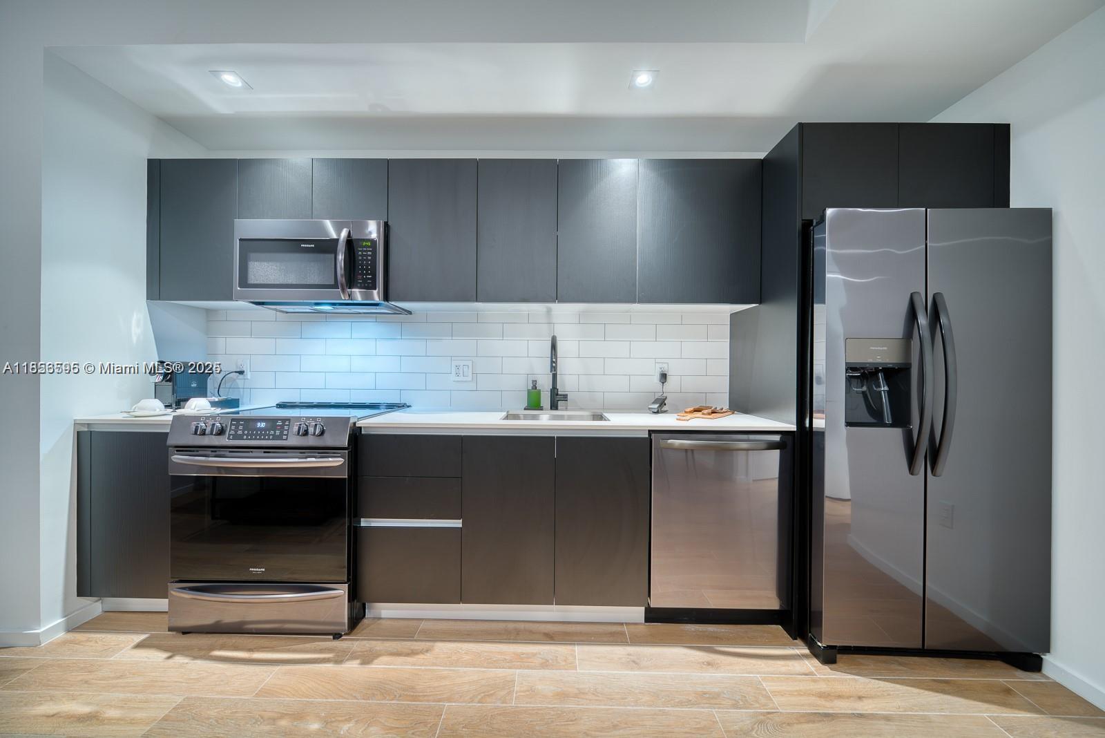 398 NE 5TH STREET CONDO - Residential