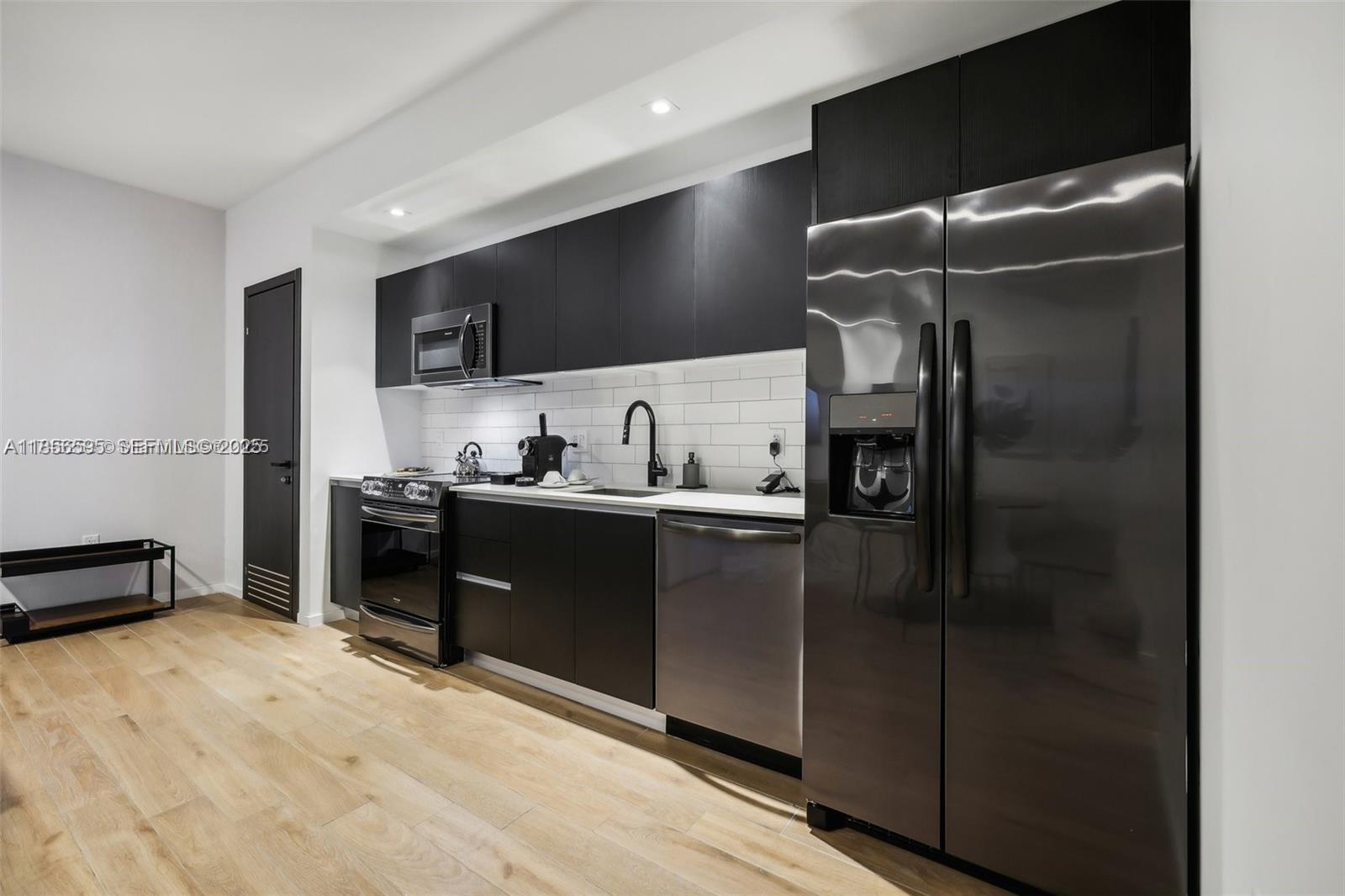 398 NE 5TH STREET CONDO - Residential